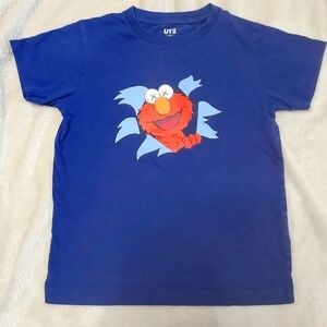 Uniclo colab with Kaws and Sesame Street shirt for boy